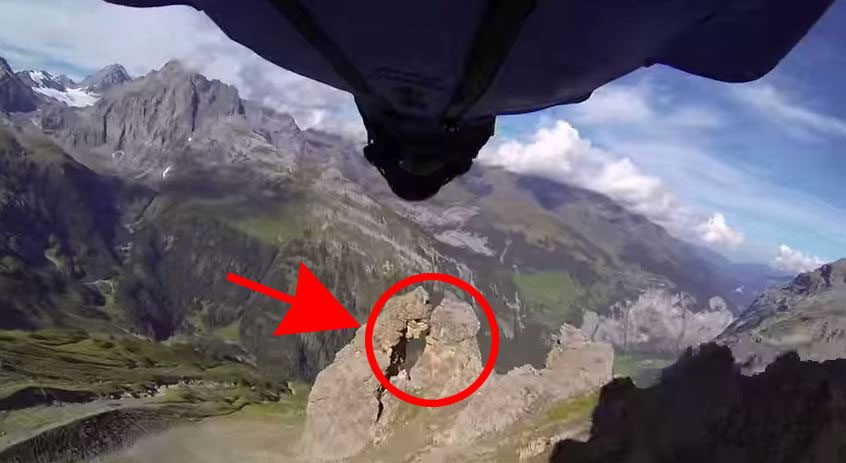 Este individuo INTENTA pasar a través de una cueva de dos metros en un wingsuit. ¡WOOOW!