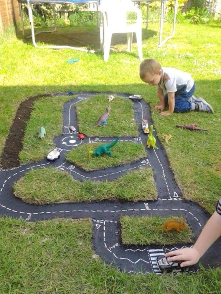 This dad makes strange shapes in the garden. What is he doing? Shiny!