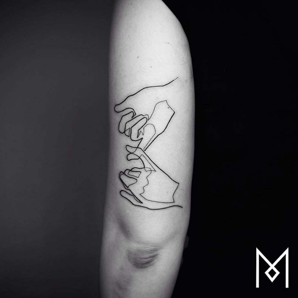Estos asombrosos tatuajes creados usando una sola línea continua sorprenden a todo el mundo