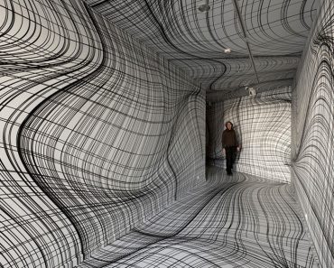 Este artista convierte paredes planas en vórtices en remolinos que sorprenderán a tu cerebro